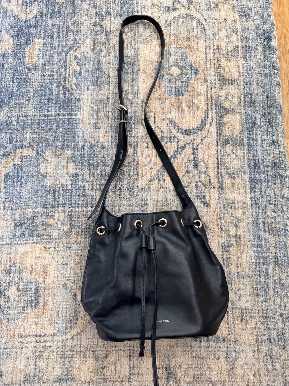 Anine Bing Black Leather Drawstring Crossbody Bag with Gold Hardware